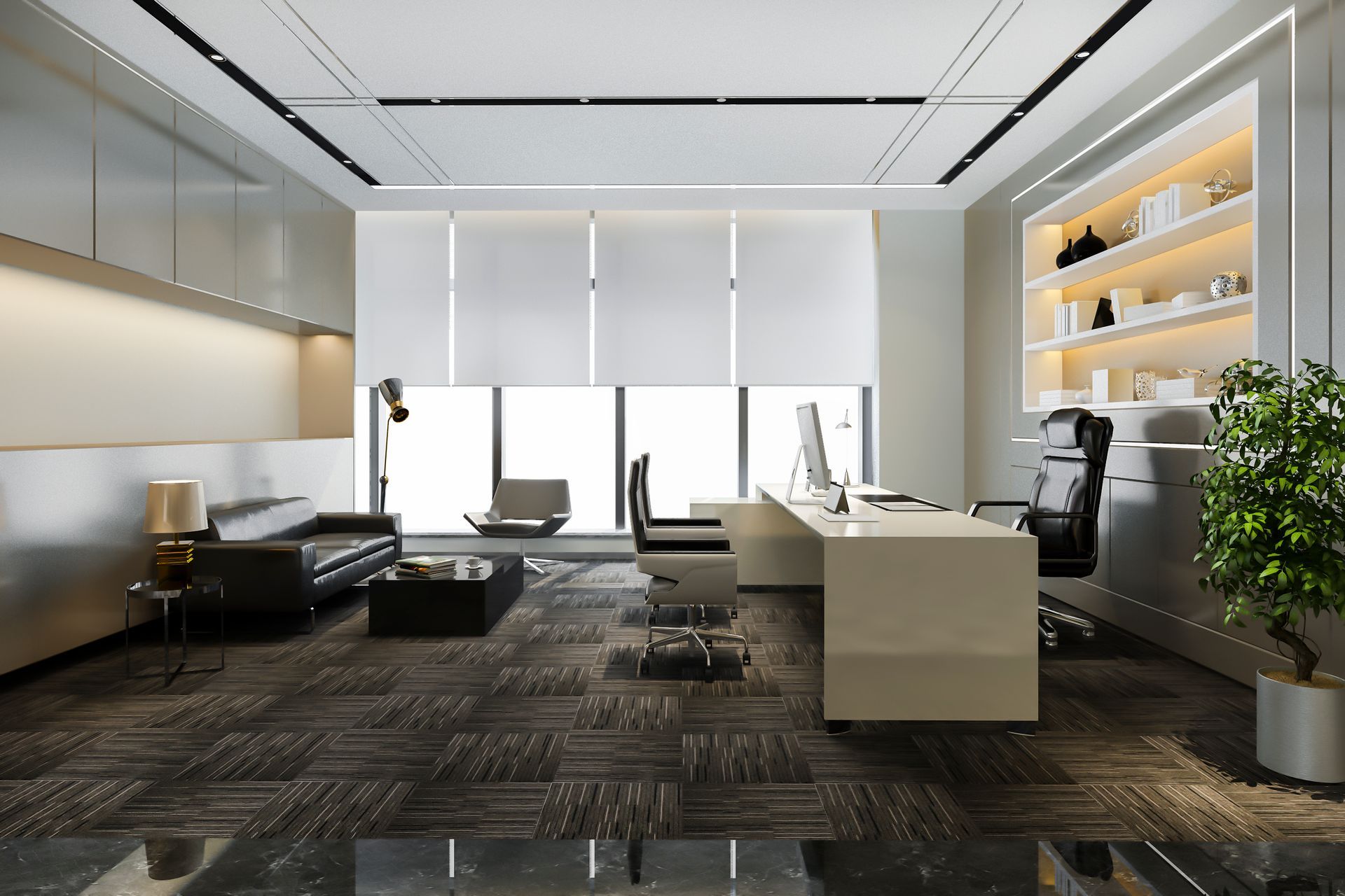 A modern office with a desk , chairs , and a couch.